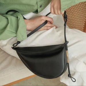 BKBC (Korean designer) Croissant bag black
